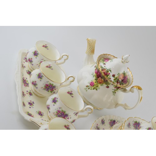 166 - Royal Albert tea ware to include an Old Country Roses teapot with a set of 6 trios in the Violetta p... 