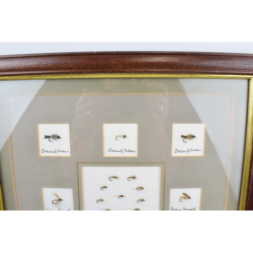 527 - A framed collection of good quality fishing flies. T.C Ivans, Nymphs.  Frank Sawyers. 39cm x 48cm in... 