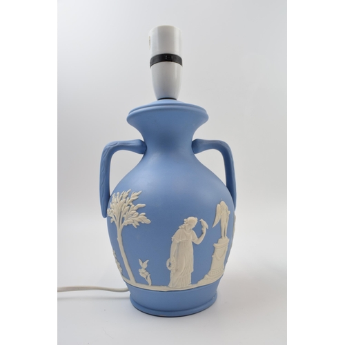 193A - A Wedgwood Queenware lamp base, cream ground with blue relief together with a similar Dudson Brother... 