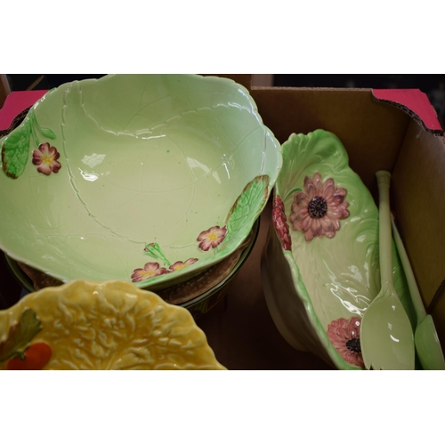 108 - A collection of cabbage ware dinner ware items to include bowls, salad servers and others to include... 