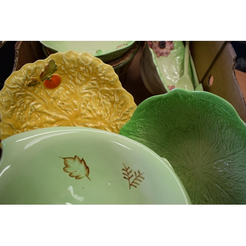 108 - A collection of cabbage ware dinner ware items to include bowls, salad servers and others to include... 