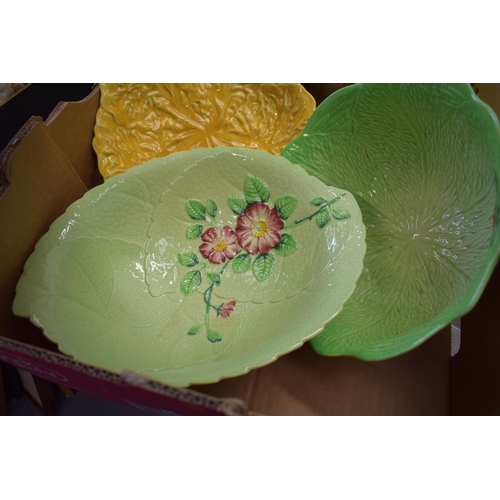 108 - A collection of cabbage ware dinner ware items to include bowls, salad servers and others to include... 