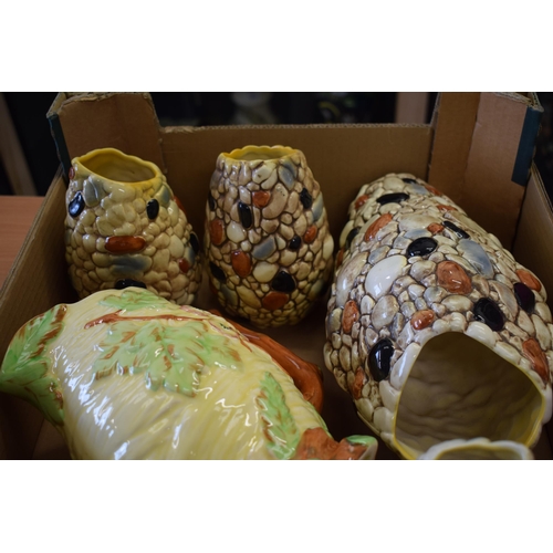 109 - Mixed pottery to include Sylvac shell and pebble vases, a Shorter and Son Art Deco jug with 20th cen... 