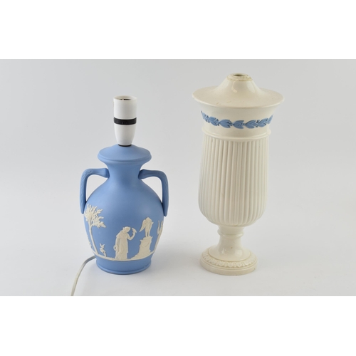 193A - A Wedgwood Queenware lamp base, cream ground with blue relief together with a similar Dudson Brother... 