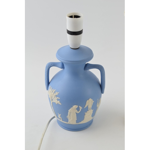 193A - A Wedgwood Queenware lamp base, cream ground with blue relief together with a similar Dudson Brother... 