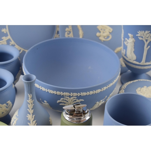 194 - Wedgwood Jasperware to include a bowl, plates, trinkets, vases etc in varying colours (Qty).