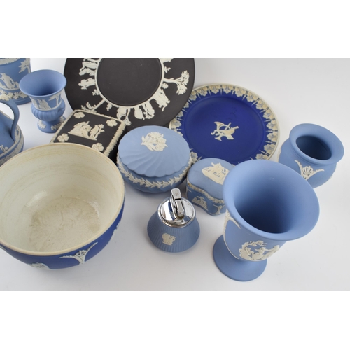 195 - Wedgwood Jasperware in varying colours to include vases, plates, trinkets and others as well as unma... 