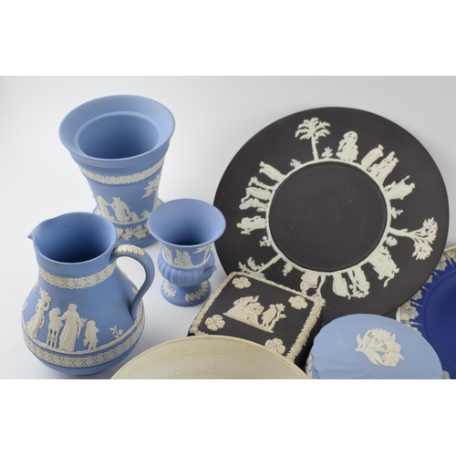 195 - Wedgwood Jasperware in varying colours to include vases, plates, trinkets and others as well as unma... 