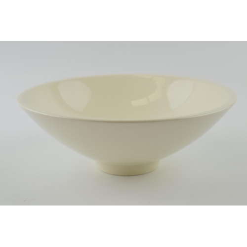 196 - Norman Wilson for Wedgwood: a cream ware pedestal bowl of modernist form, 23cm diameter, impressed N... 