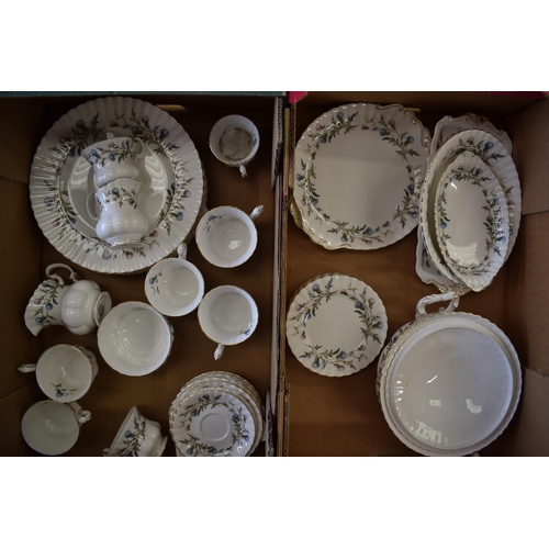 197 - A collection of Royal Albert tea and dinner ware in the Brigadoon pattern to includes cups and sauce... 