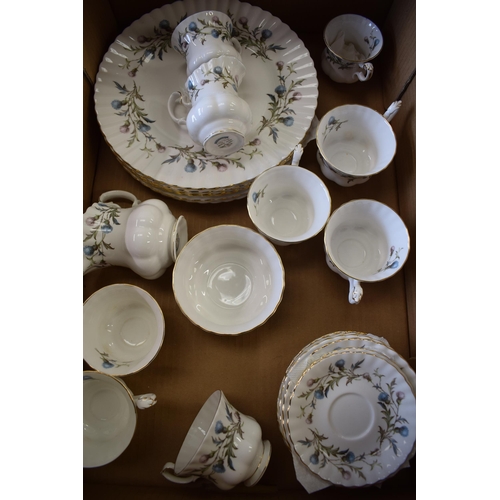 197 - A collection of Royal Albert tea and dinner ware in the Brigadoon pattern to includes cups and sauce... 