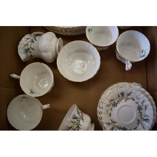 197 - A collection of Royal Albert tea and dinner ware in the Brigadoon pattern to includes cups and sauce... 