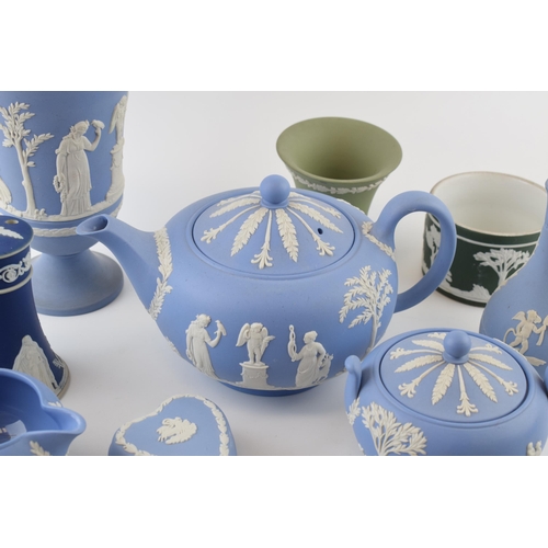 199 - Wedgwood Jasperware to include a blue teapot, a boxed silver brooch, vases and others with 2 non Wed... 