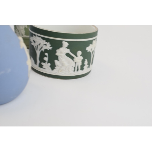 199 - Wedgwood Jasperware to include a blue teapot, a boxed silver brooch, vases and others with 2 non Wed... 