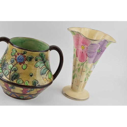 21 - A pair of Arthur Woods floral shaped trumpet vases and a large two handled floral vase, believed to ... 