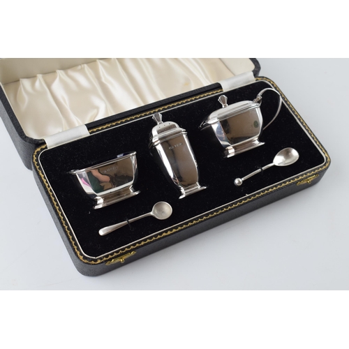 227 - Cased hallmarked silver Art Deco cruet set with assosciated spoons, Birmingham 1924, 131.1 grams of ... 