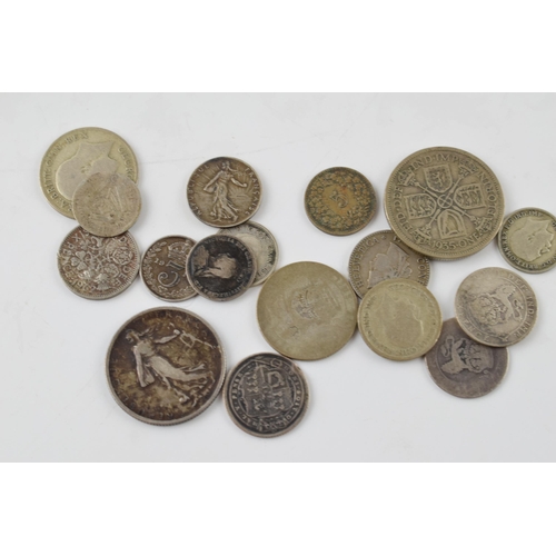 228 - Mixed coins to include examples from across the world, circa 59 grams of silver coinage to include B... 