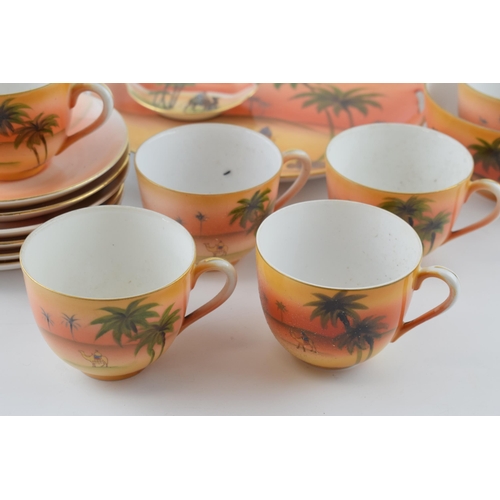 24 - Noritake tea ware in an Eastern desert pattern to include cups, saucers, side plates and others.