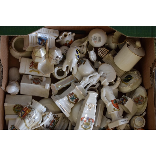 26 - A collection of crested china items to include animals, jugs, vases and varying forms and decoration... 