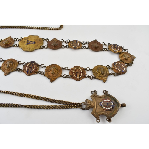 302 - Masonic Interest: a Masonic regalia / chain collar with a quantity of enamel, gilt metal and metal b... 