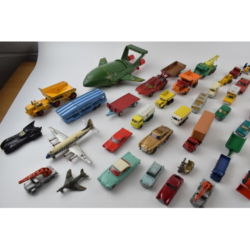 329 - A collection of unboxed vintage die-cast model vehicles by manufacturers Dinky, Corgi and Matchbox a... 