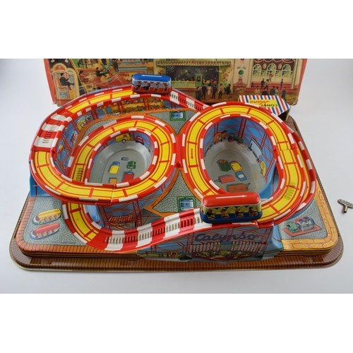 335 - A boxed Technofix Coney Island 307made in Germany tinplate and early plastic roller coaster clockwor... 