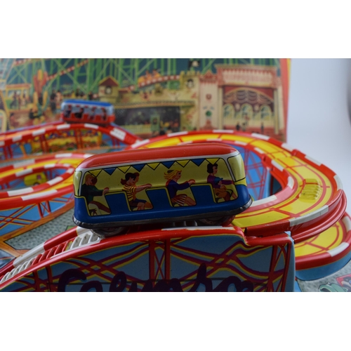 335 - A boxed Technofix Coney Island 307made in Germany tinplate and early plastic roller coaster clockwor... 