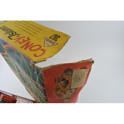 335 - A boxed Technofix Coney Island 307made in Germany tinplate and early plastic roller coaster clockwor... 