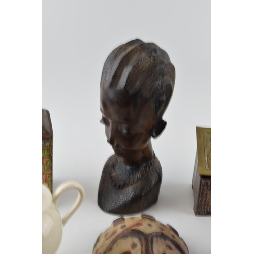 339 - Interesting items to include a carved tribal bust, a tribal wooden mask, a Crawfords biscuit tin, a ... 