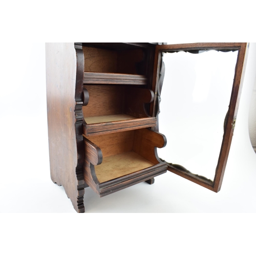 360 - Antique miniature display cabinet with three pull out drawers and glazed front door. 40cm x 20cm x 1... 