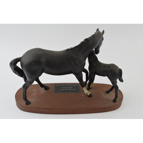 53 - Beswick Black Beauty and Foal on wooden base.