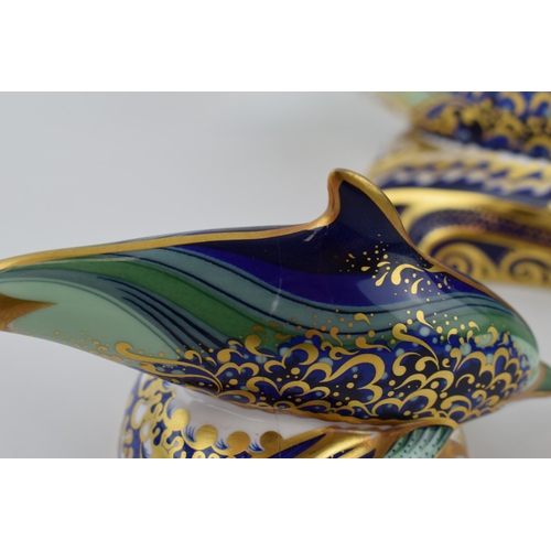 7 - A Royal Crown Derby paperweight, Bottlenose Dolphin and Baby Bottlenose Dolphin (a/f), decorated in ... 