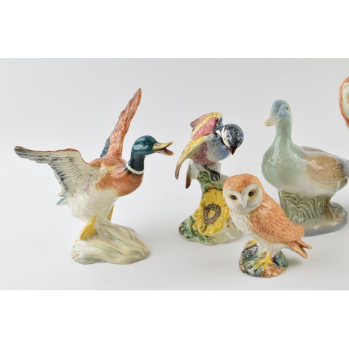 84 - Beswick to include flying mallard 749 (1 wing af), a large barn owl, small barn owl, a Chickadee (wi... 