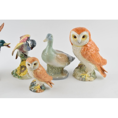 84 - Beswick to include flying mallard 749 (1 wing af), a large barn owl, small barn owl, a Chickadee (wi... 