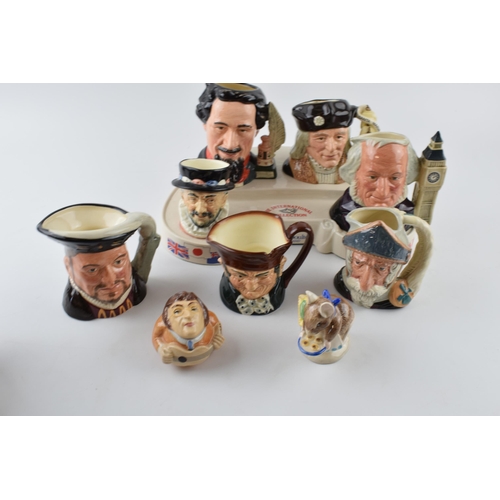 114 - Royal Doulton to include character jugs such as Christopher Columbus, Charles Dickens, a GR hyphon b... 