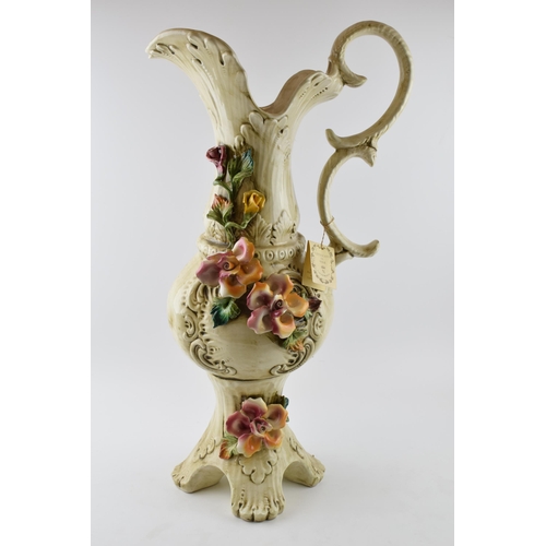 120 - Large Capo Di Monte floral jug with relief floral decoration, 66cm tall.