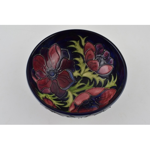 130 - Moorcroft clematis on blue bowl, 16cm diameter, silver line.