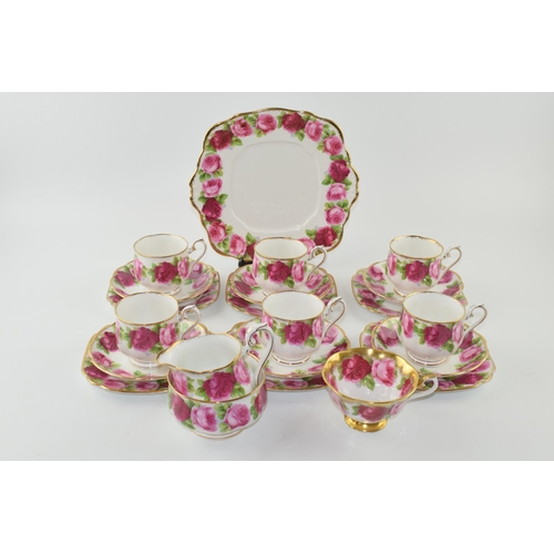 204 - Royal Albert Old English Rose to include 6 cups, 6 saucers, 6 side plates, a Treasure Chest cup, a m... 