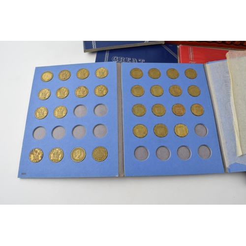 236 - Coins to include a selection of Whitman coin folders of varying denominations to include silver exam... 