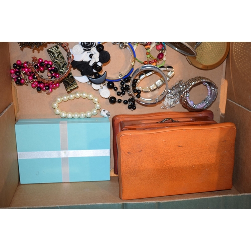 238 - A quantity of mixed vintage and modern costume jewellery to include brooches, watches, necklaces, fa... 