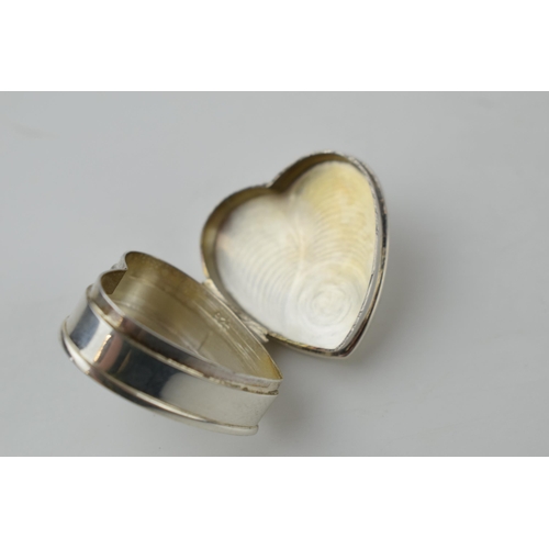 243 - Silver 925 heart shaped trinket box with hinged lid, 10.3 grams.