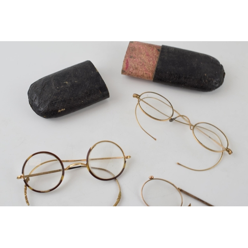 245 - A collection of rolled gold Georgian style spectacles and associated case (Qty).