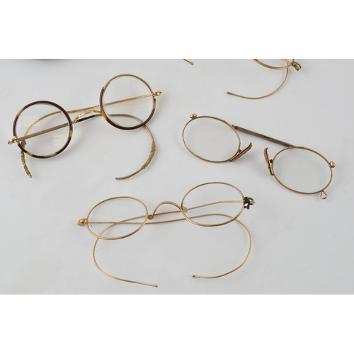 245 - A collection of rolled gold Georgian style spectacles and associated case (Qty).