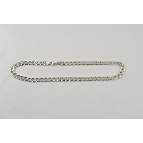 248 - Silver curb link chain with lobster claw clasp marked 925 Italy. Length including clasp 56.5cm. Weig... 