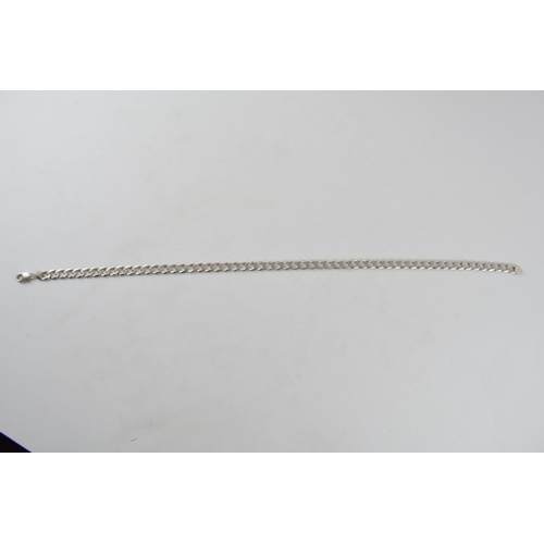 248 - Silver curb link chain with lobster claw clasp marked 925 Italy. Length including clasp 56.5cm. Weig... 