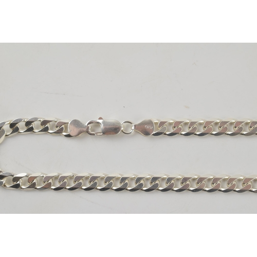 249 - Silver curb link chain with lobster claw clasp marked 925 Italy. Length including clasp 56.5cm. Weig... 