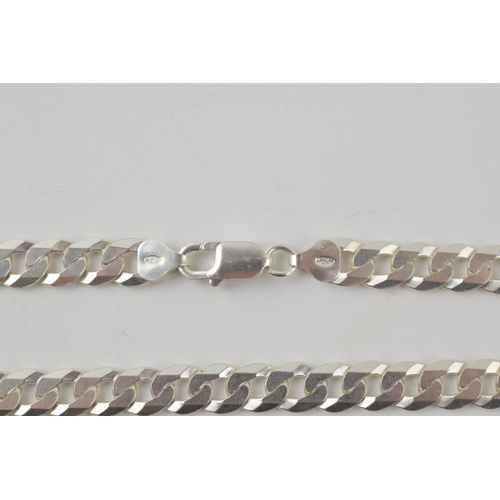 254 - Silver curb link chain with lobster claw clasp marked 925 Italy. Length including clasp 51cm. Weight... 