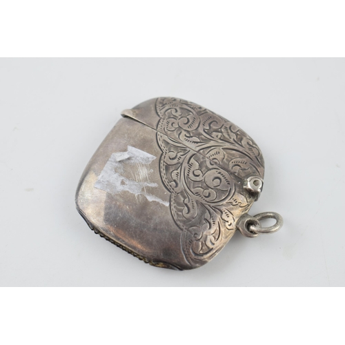 257 - Hallmarked silver vesta case with engraved decoration, 16.2 grams, Birmingham 1909.