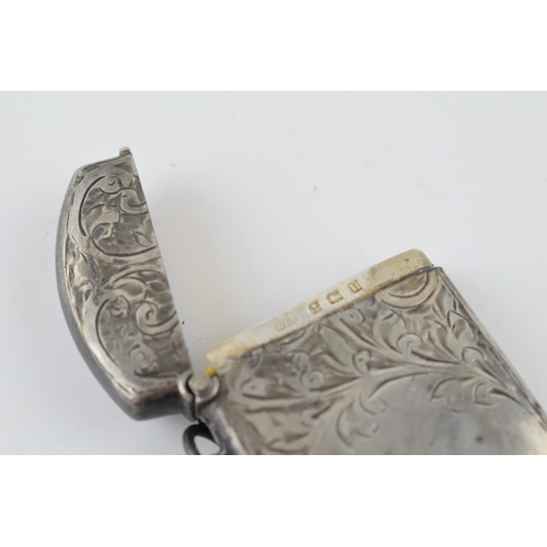 260 - Hallmarked silver vesta case with engraved decoration, 23.4 grams, Birmingham 1912.