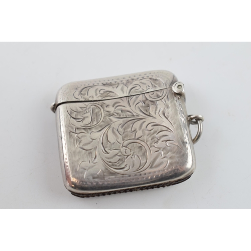 261 - Hallmarked silver vesta case with engraved decoration, 20.8 grams, Birmingham 1910.